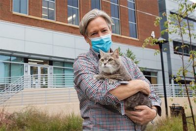 Animal Cancer Care and Research Center's first client, Peter Haberkorn, and his cat, Kokomo